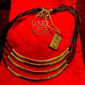 UNO DE 50 Gold four tiered necklace. New with Tags.